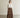 Full body view of the model wearing Savannah Maxi Skirt | Golden
